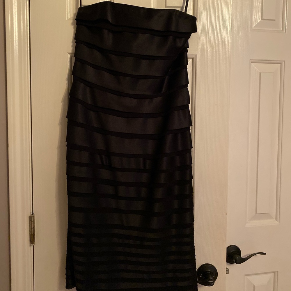 Black strapless dress.